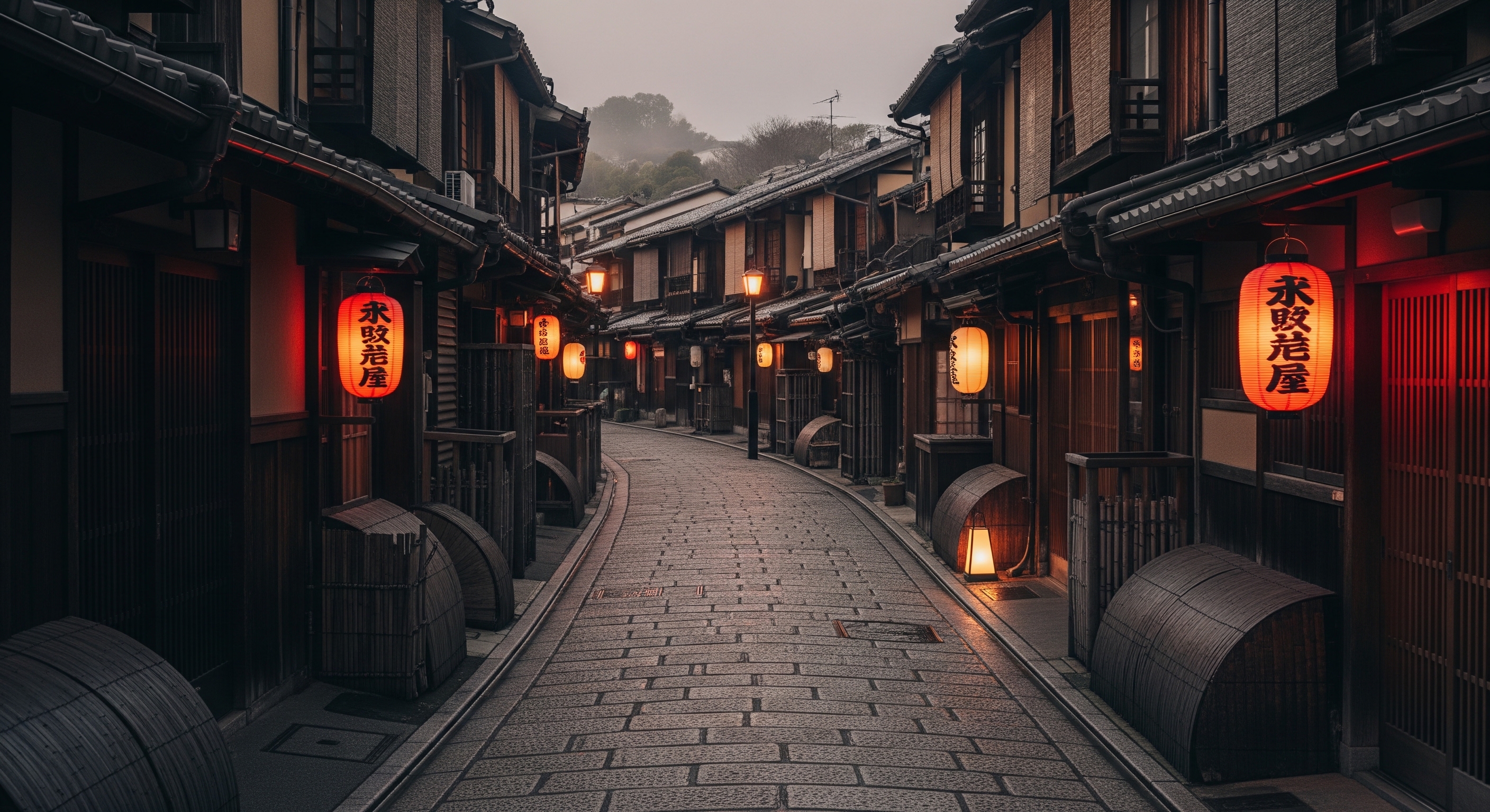 Lantern-lit Hanamikoji Street in Gion at dusk