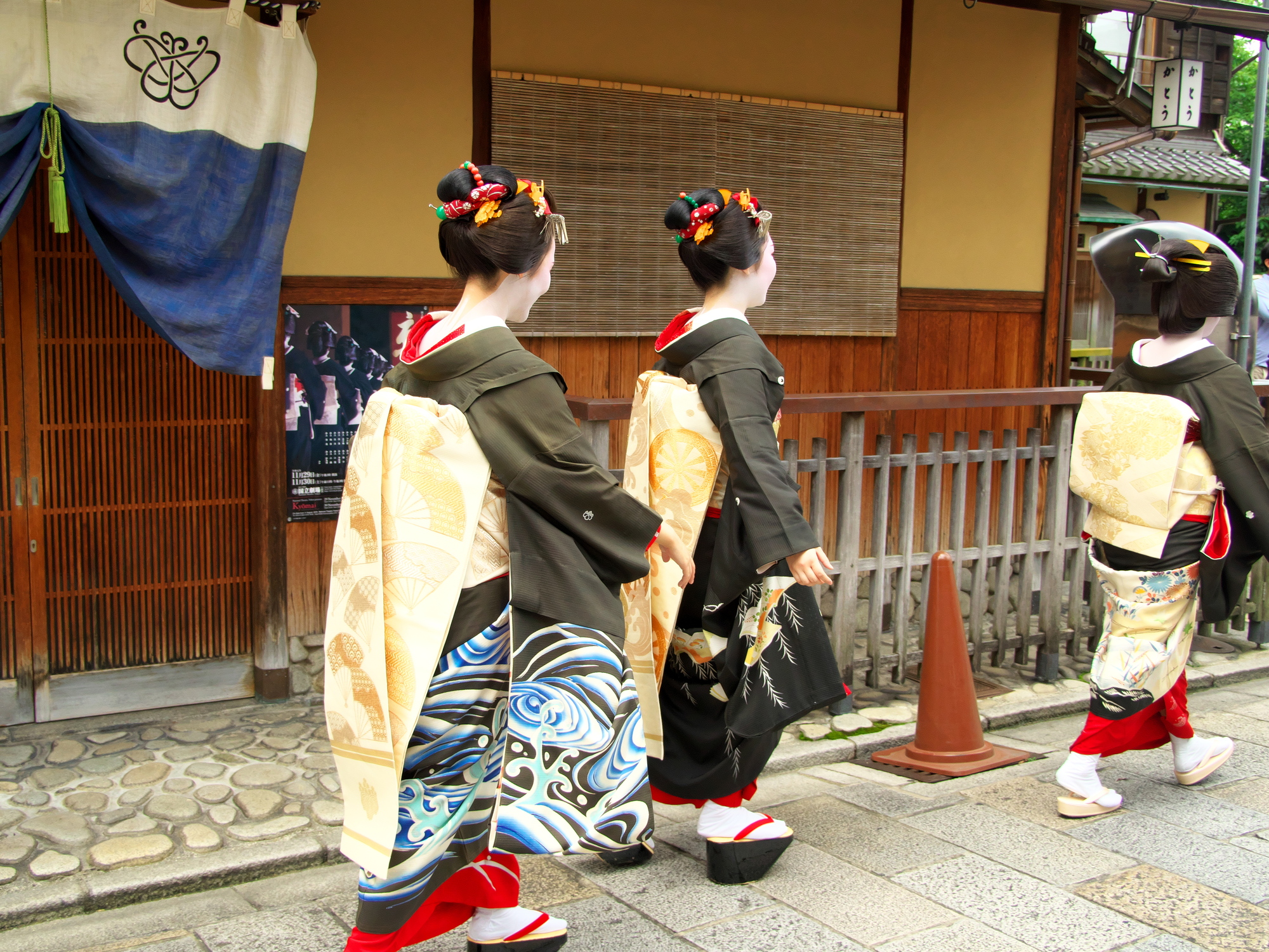 Maiko walking in Gion